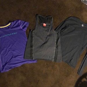 Nike shirts small and medium. Purple and black.